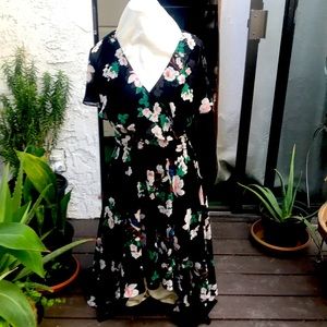 Beautiful High-low dress .zips from behind with straps to tie in the back